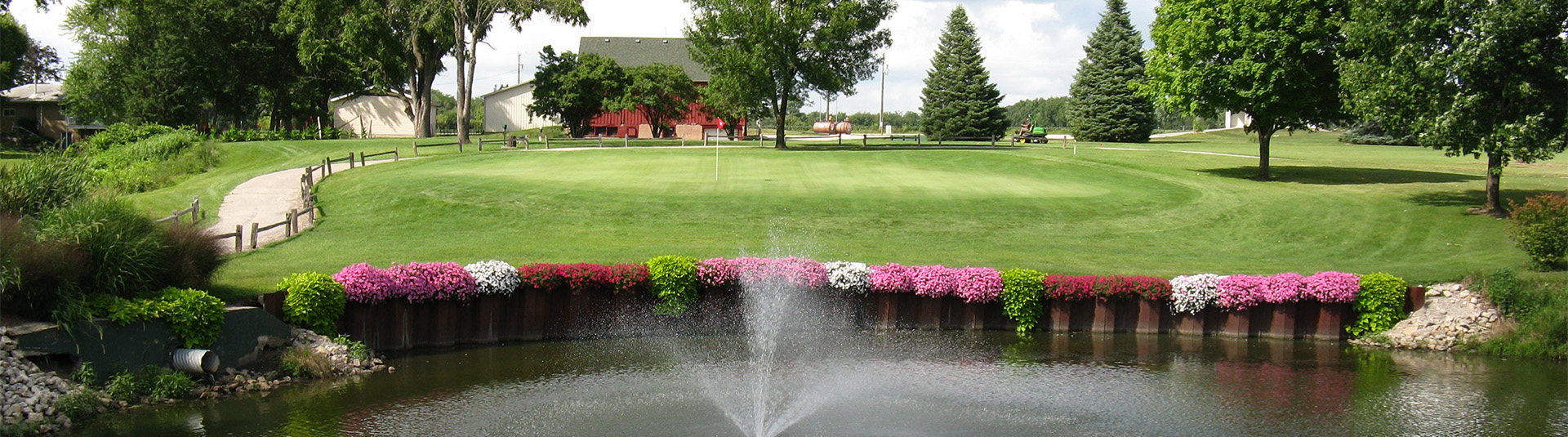 pond with flowers on golf course